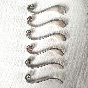 Portes couteaux forme vague rouleau créateur en métal argenté